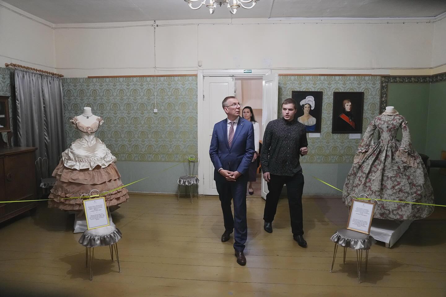 President viewing historical costume exhibit